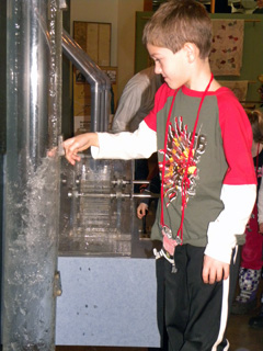 Boy at water power station