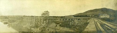 View of railway tracks and a shipping pier at Mabou Mines, circa 1915.