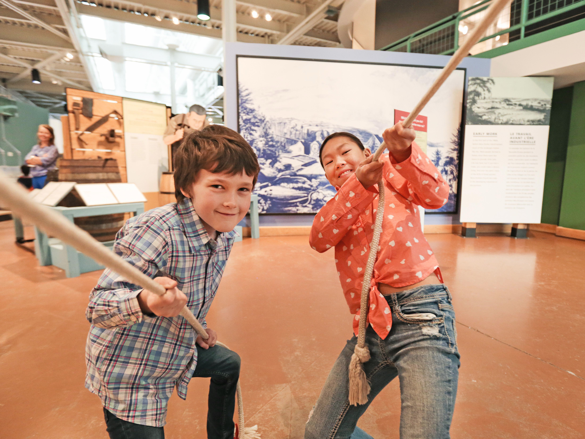 Children pulling on ropes at the Museum of Industry.