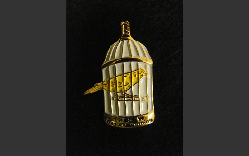 This little lapel pin was part of the protest following the Westray mining disaster in Plymouth, N.S. in 1992. The families of the 26 miners killed and their supporters lobbied for improved worker safety legislation. The canary is a symbol related to mine safety and the legend at the bottom reads: “USW Day of Mourning”. Not currently on display