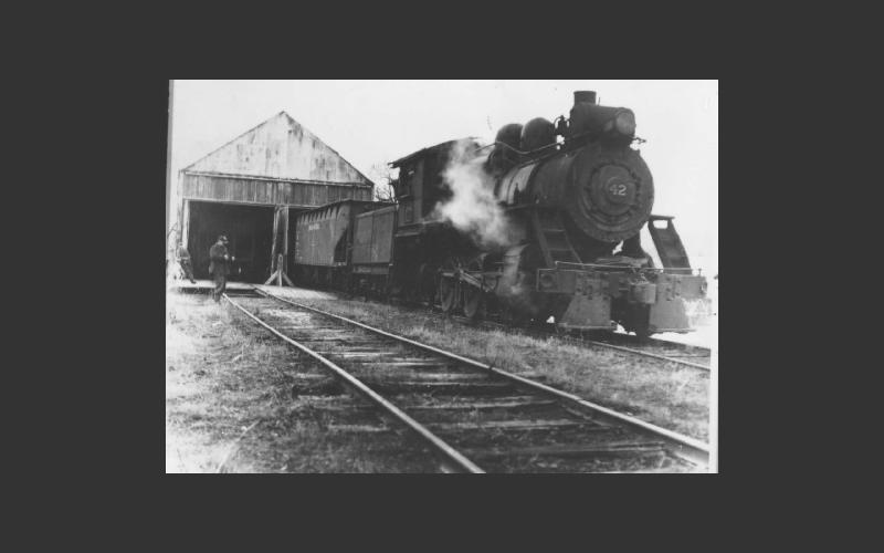 One of many railway photos in our collection. This shows Locomotive 42 (which is also an artifact in our collection) at the railway sheds in Stellarton.