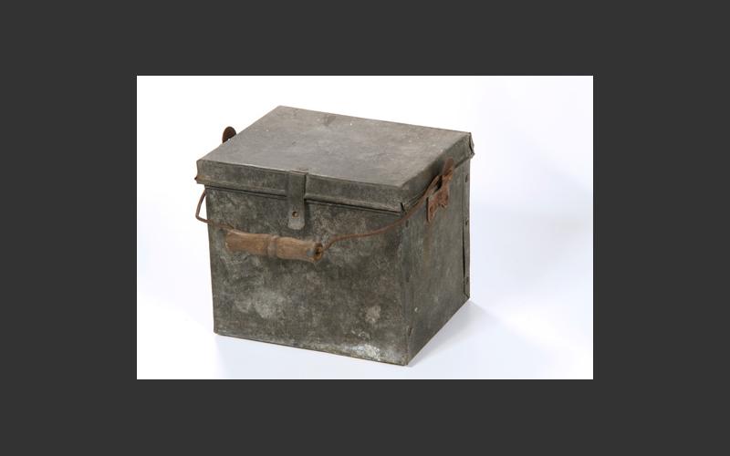 Not a lunch can; this is a shotfirer’s powder box. The shotfirer created controlled explosions in the mine to remove rock and expose the coal.