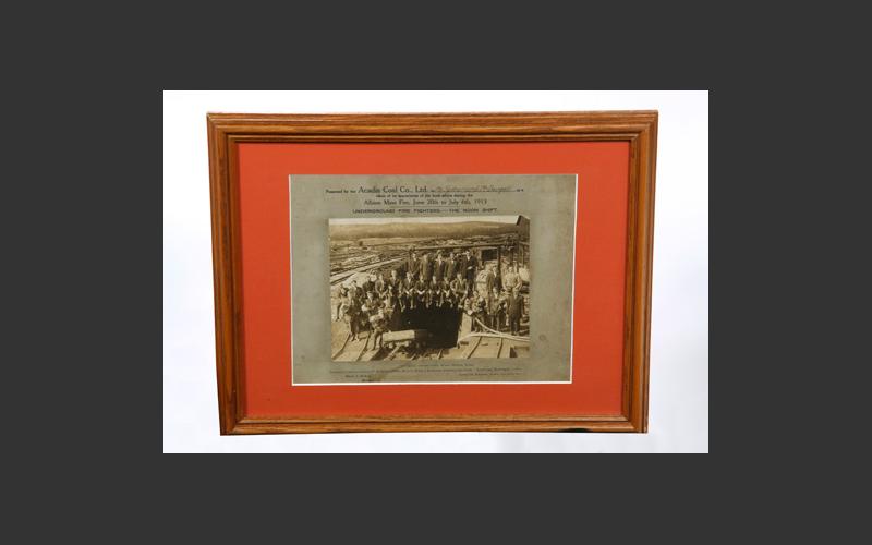 A framed photo of the firefighting team at Albion Mines, 1913.