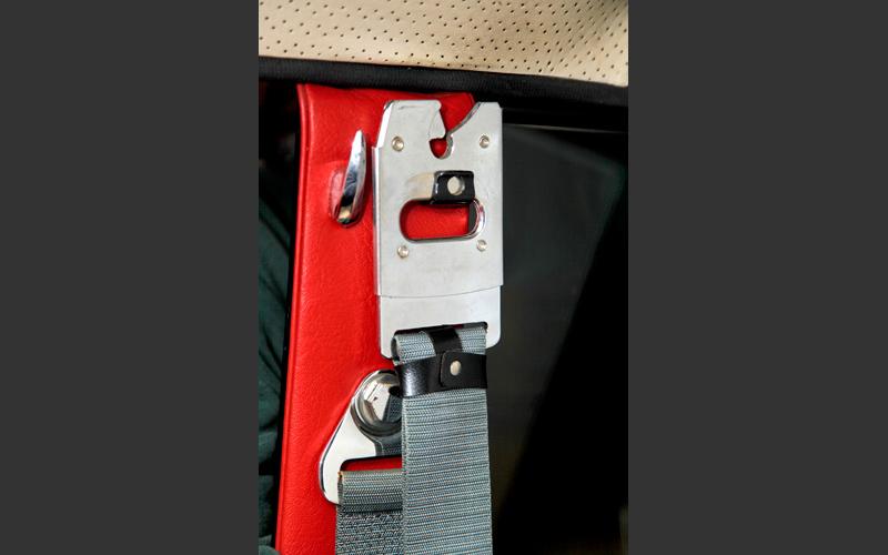 The shoulder seatbelt inside our Volvo. Volvo was the first to introduce this safety innovation, making it standard equipment from 1959 onward.