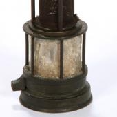 The Foord Pit suffered a terrible explosion in 1880 which killed 44 men. In 1927 a crew opening the Alan Shaft mine tunneled through to the site of the disaster and found the remains of some of the victims and relics like this lamp, its glass fused by the heat of the explosion.