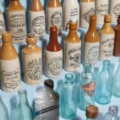 Nova Scotia soft drinks bottles. Some are made of pottery and some of glass. A wide range of flavours from ginger beer to orange pulpy was made in small shops across the province.
