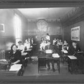 The typing class. This photo was taken at a Nova Scotia business school in the early 1920s. Note how few male students are in the class. The introduction of the typewriter brought many more women into offices starting in the late 1800s.