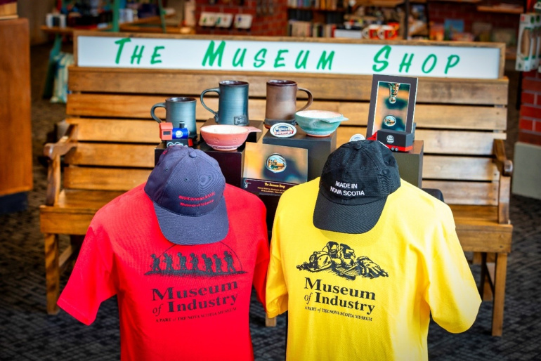 Custom clothing and giftware with museum branding.