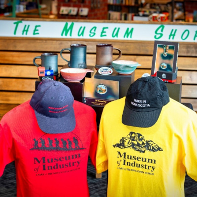 Custom clothing and giftware with museum branding.