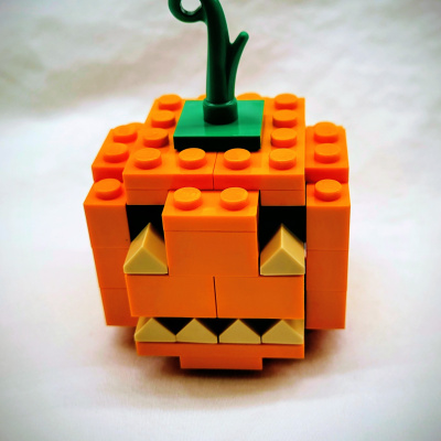 A small jack o' lantern made of LEGO.